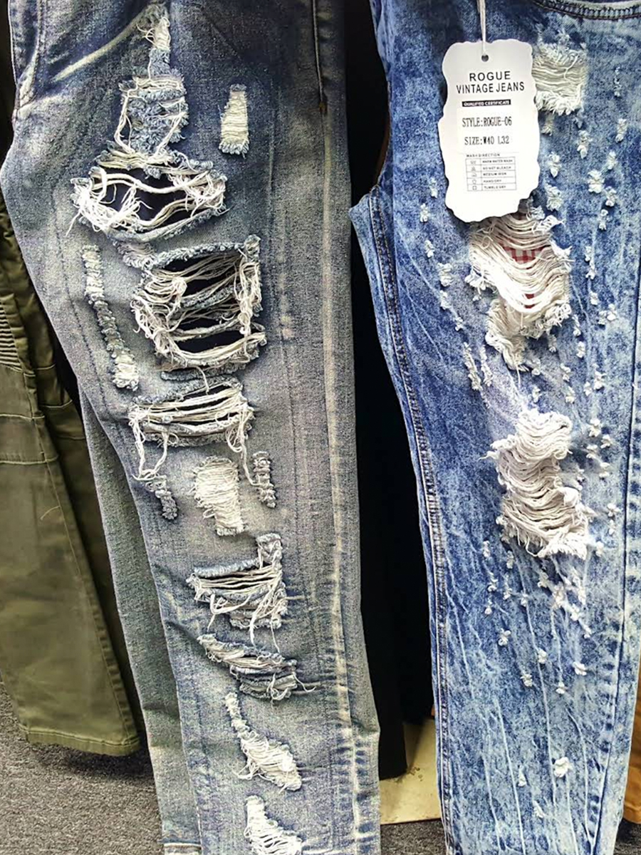 Inside SOLO FOR MEN — denim wall